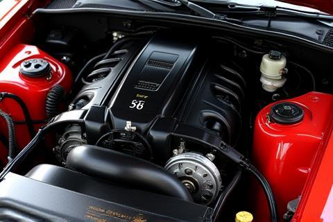 A perfectly cleaned engine bay, free from dirt and grime, showcasing detailed components.